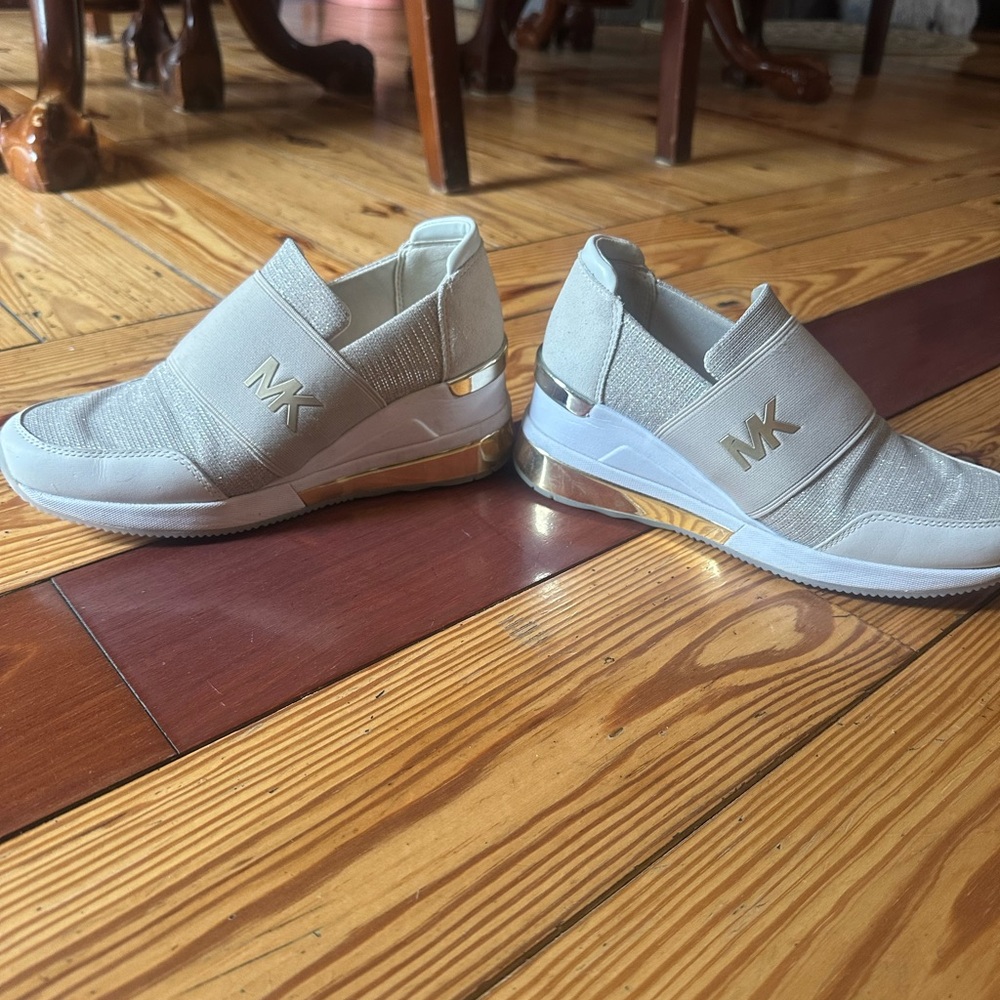 Michael Kors Slip-On Sneakers in cream and Gold Used one time for 2 hours